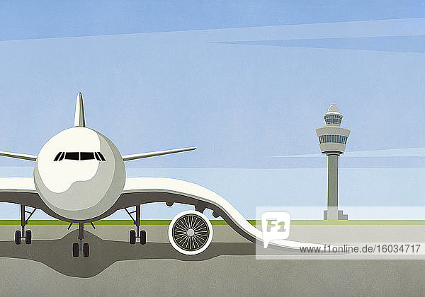 Flugzeug mit hängenden Flügeln auf leerem Rollfeld geparkt