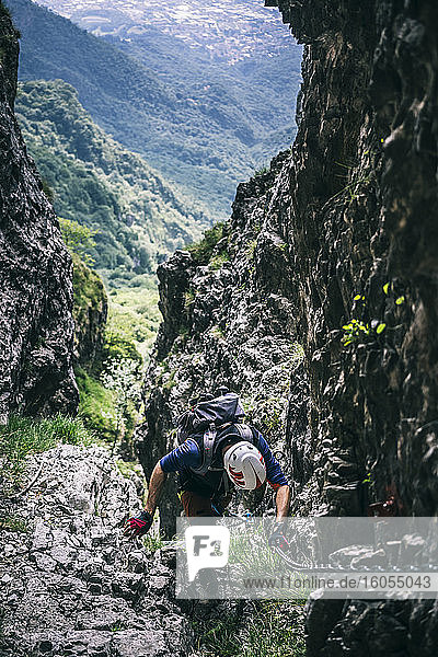 Mountaineer climbing on via ferrata  Orobie  European Alps  Como  Italy