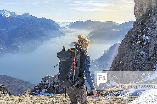 Woman hiking in the mountains at Lake Como  Italy