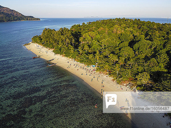 Thailand  Satun Province  Ko Lipe  Aerial view of people relaxing along sandy coastal beach in summer