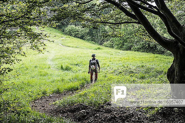 Hiker walking on mountain meadow  Orobie  European Alps  Como  Italy