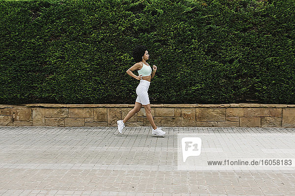 Female jogger on steps