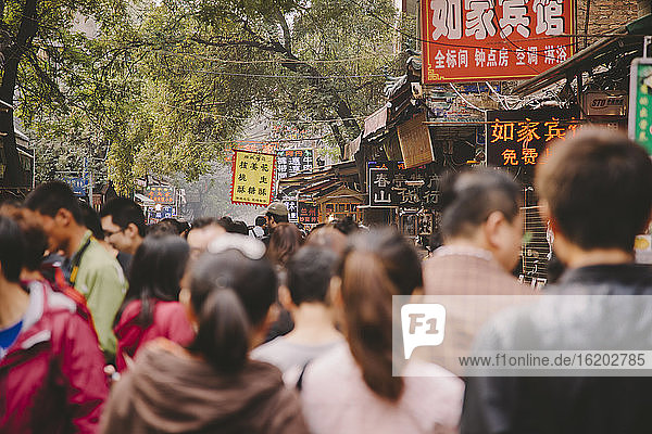 Crowds on street in Muslim quarter, Xian, Shaanxi Province, China