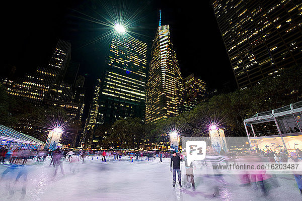 Ice skating at Bryant Park  Manhattan  New York City  USA