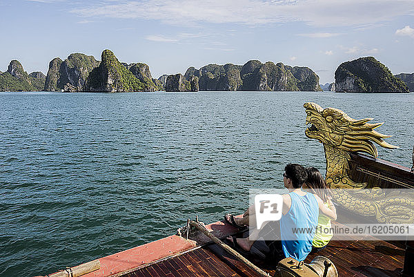 Couple enjoying view on cruise boat  Ha Long Bay  Vietnam