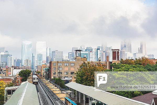 Cityscape and skyline with Ashland railway station, Chicago, USA