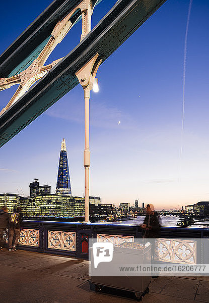 View of the Shard from Tower Bridge at night  London  UK