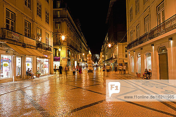 Europe  Portugal  Lisbon  Baixa  View of Rua Augusta road with pedestrian and shopping mile at night