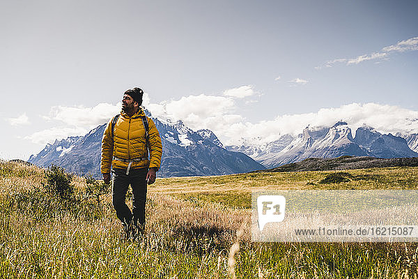 Hiker exploring Torres Del Paine National Park in Patagonia  South America