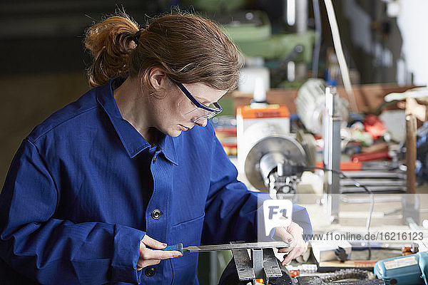 Germany  Kaufbeuren  Woman working in manufacturing industry