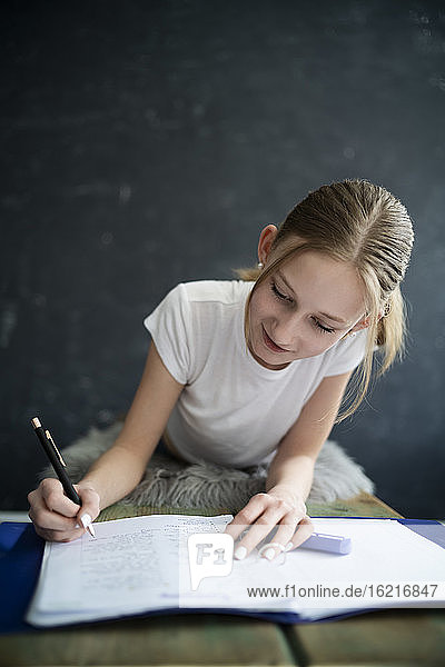 Girl learning at home