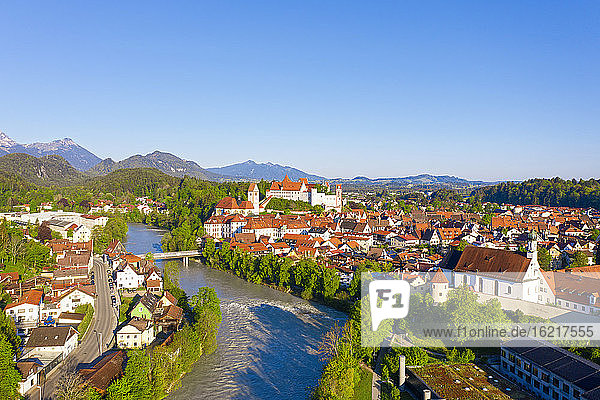 Germany  Bavaria  Fussen  Drone view of riverside town in summer