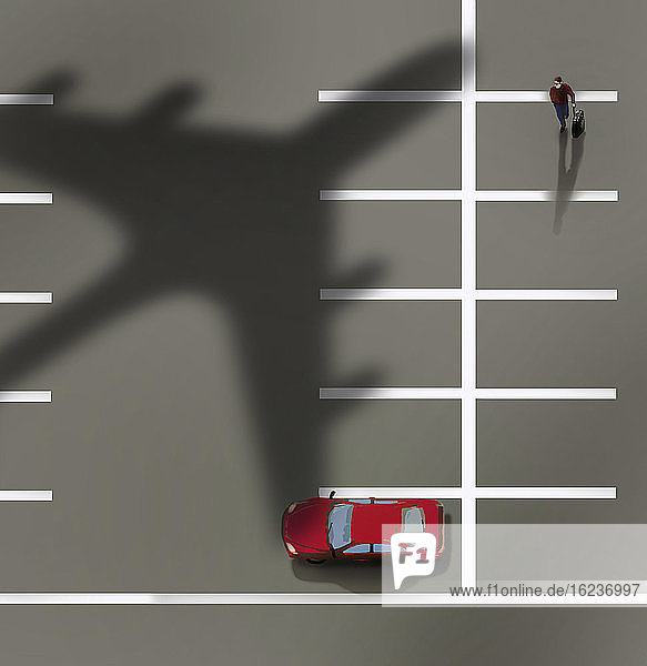 Ein Mann geht auf einem leeren Flughafenparkplatz auf ein Auto zu