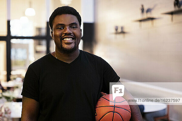 Portrait of smiling basketball player