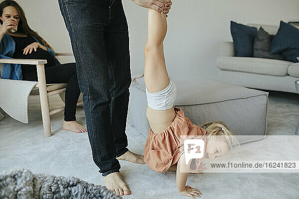 Father playing with daughter