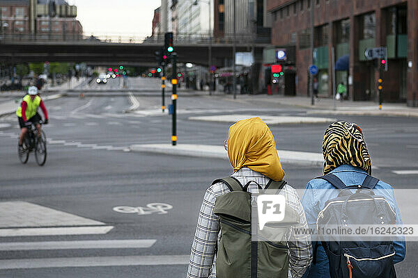 Female friends walking together
