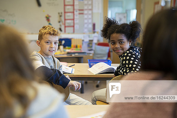 Boy and girl in classroom