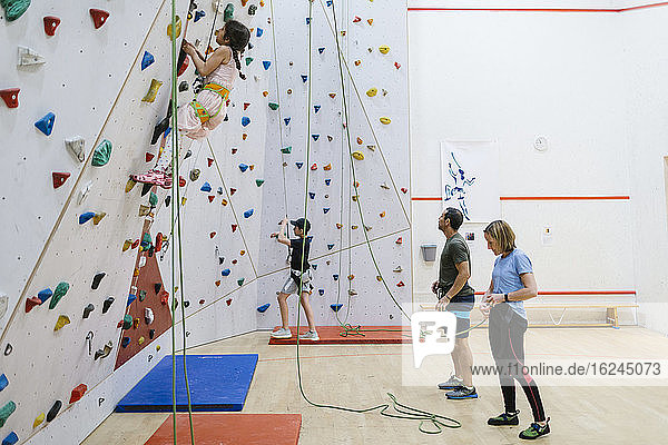 Family in climbing gym