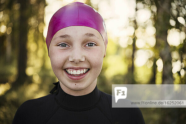 Portrait of girl wearing swimming cap
