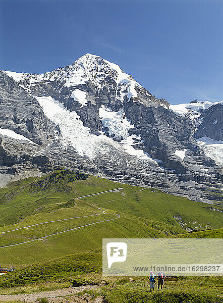 Switzerland  Bernese Oberland  Grindelwald  Hiker looking at mountain view