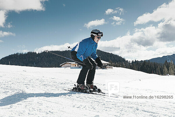 Germany  Bavaria  Winklmoosalm  Mature man skiing downhill