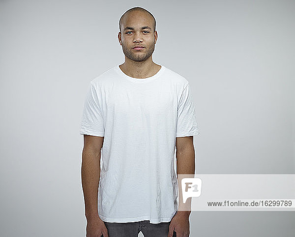 Portrait of young African man wearing white t-shirt
