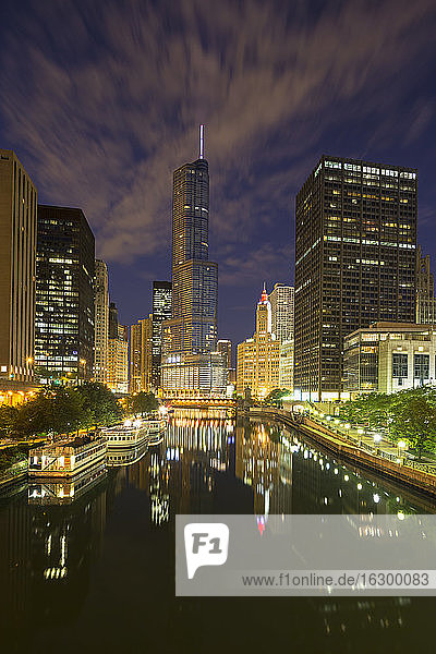 USA  Illinois  Chicago  High-rise buildings  Trump Tower at Chicago River at night