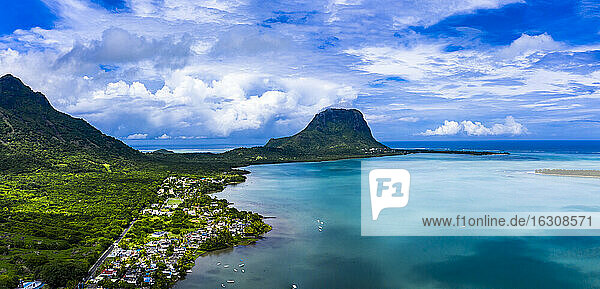 Mauritius  Black River  Tamarin  Helicopter view of coastal village with Le Morne Brabant mountain in background