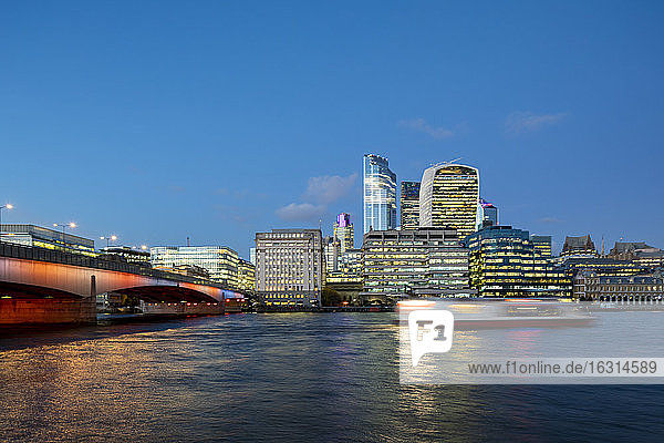 London Bridge across the River Thames lit up with colorful lighting  London  England  United Kingdom  Europe