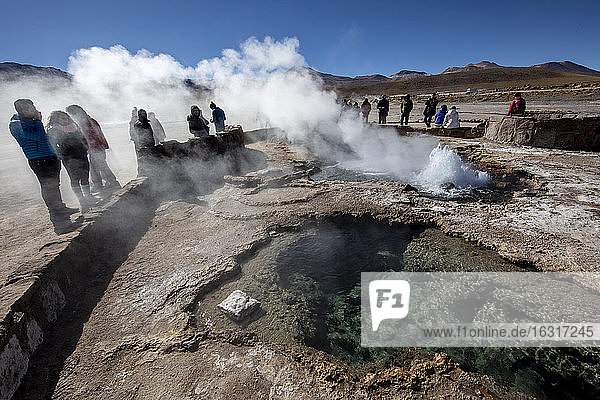 Tourists at the Geysers del Tatio (El Tatio)  the third largest geyser field in the world  Andean Central Volcanic Zone  Antofagasta Region  Chile  South America