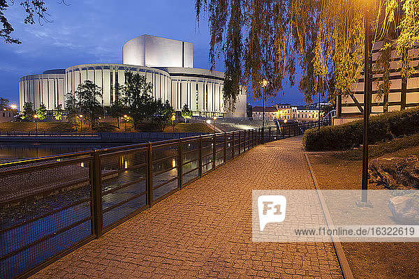 Poland Bydgoszcz Opera Nova at night alley on Mill Island along Brda River