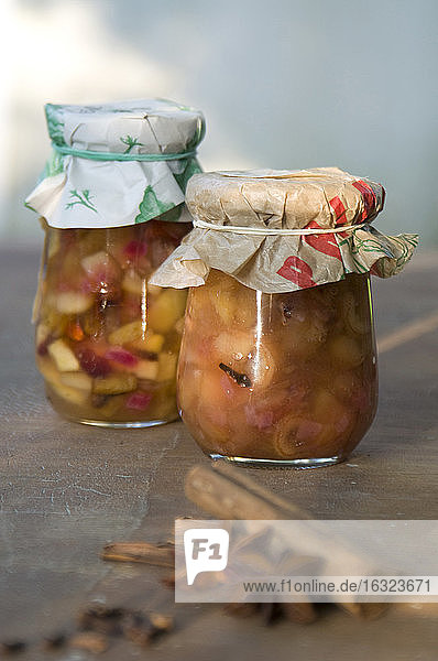 Two preserving jars of pear chutney