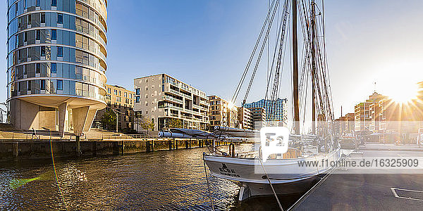 Germany  Hamburg  HafenCity  traditional ship harbor Sandtorhafen and modern multi-family houses