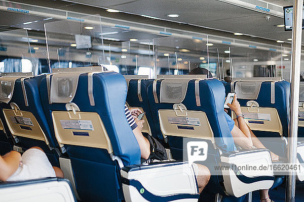 Seats with glass screens in cruise ship during pandemic