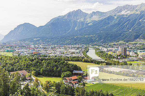 Austria  Tyrol  Innsbruck  City on River Inn in summer with mountains in background
