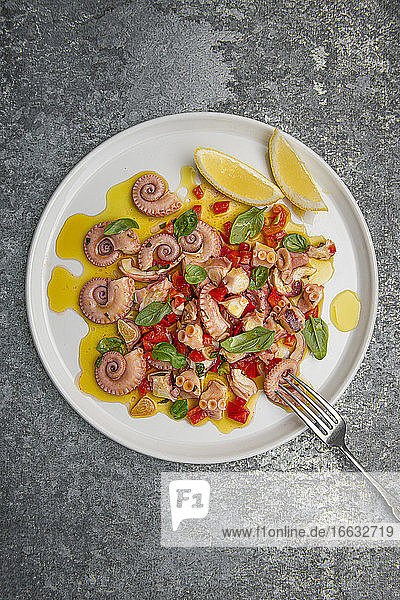 Marinated octopus in olive oil  red pepper  lemon and garlic