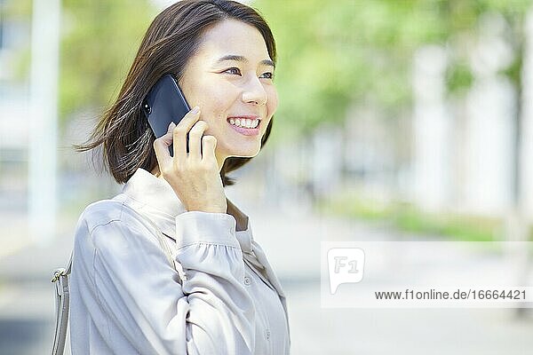 Young Japanese Woman Calling
