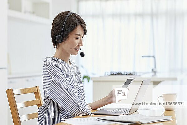 Japanese woman working from home