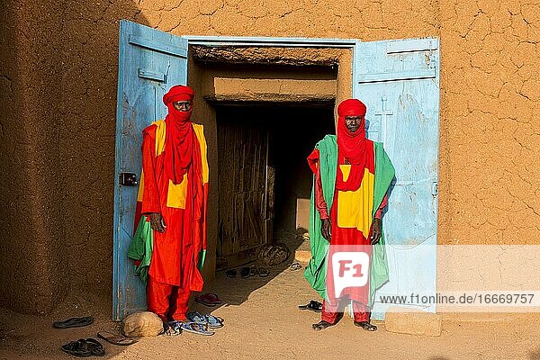Colourful dressed bodyguards of the sultan of Agadez Unesco world heritage sight Agadez Niger Africa