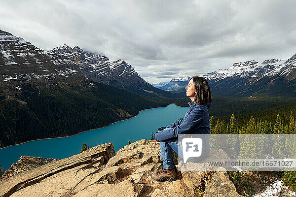 Girl Enjoying The View On A Hike At Peyto Lake  Banff National Park