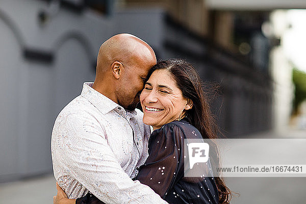 Late Forties Couple Embracing in San Diego