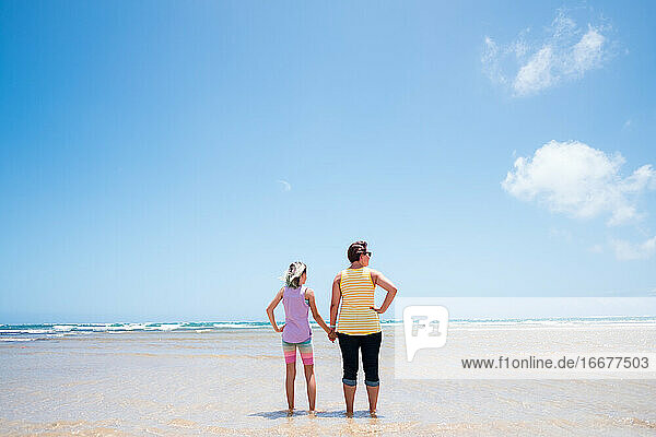 mother and daughter on the kailua beach in hawaii