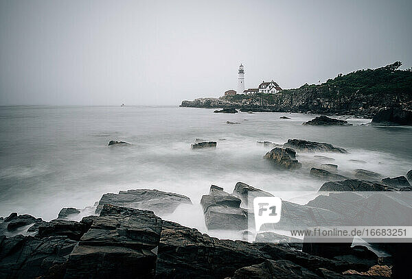 Foggy morning off the shore of Maine with the Portland Head Light