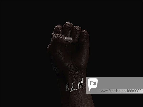 Black Lives Matter Quote on the hand of Black women.