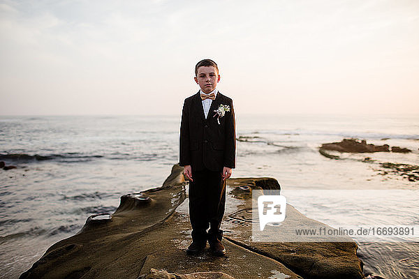 Nine Year Old Boy in Tux on Beach in San Diego