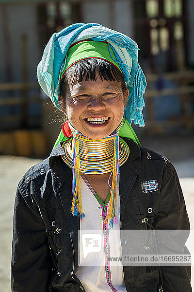 Portrait of smiling Burmese woman from Kayan tribe  Loikaw  Myanmar