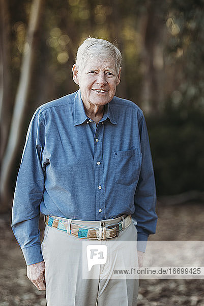 Portrait of Senior Adult Male Smiling in Forest