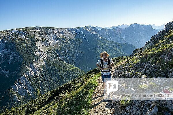 Mountaineer  hiker on hiking trail to the Bärenkopf  in the back ridge Stanser-Joch-Kamm with Stanser Joch  Karwendel  Tyrol  Austria  Europe