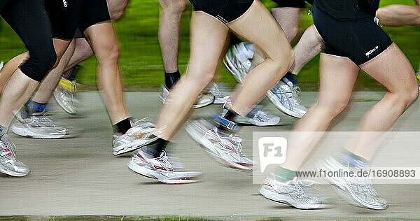 Legs of runners in motion  Germany  Europe