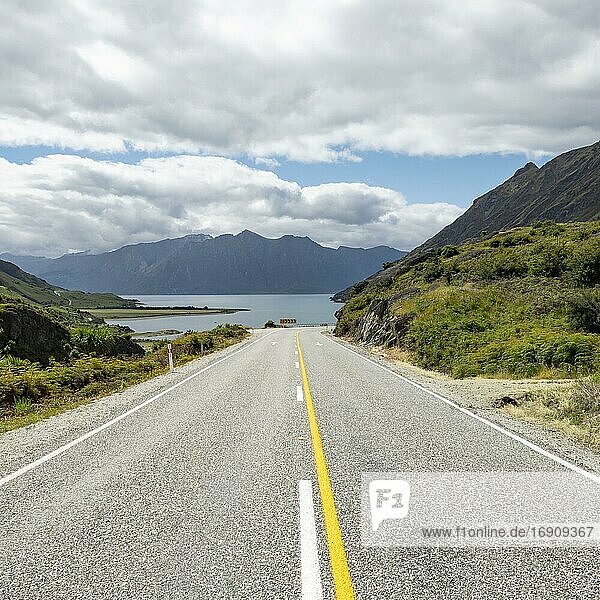 Road with views of mountains and Lake Hawea  The Neck  Otago  South Island  New Zealand  Oceania